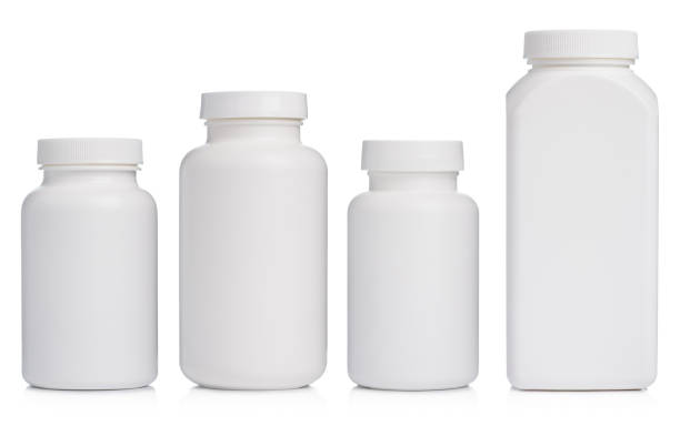 Blank plastic bottles with supplements or medication isolated on white