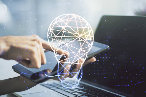 Double exposure of creative light bulb hologram with finger clicks on a digital tablet on background, research and development concept