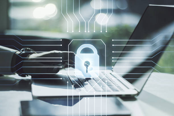 istock Creative idea concept with lock symbol and microcircuit illustration and hands typing on laptop on background. Protection and firewall concept. Multiexposure 1413839646