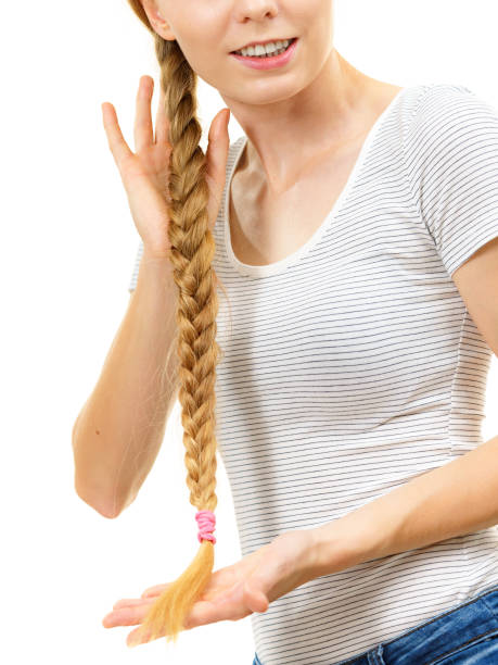 istock Blonde young woman with braid hair 1413840441