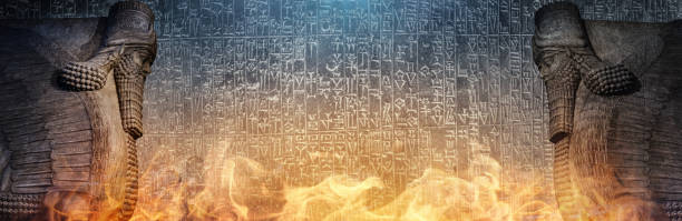 Ancient cuneiform Sumerian text and winged statue of Lamassu, a mythical Assyrian deity. Historical background on the theme of civilizations of Assyria, Mesopotamia, Babylon, interfluve, Sumerian.