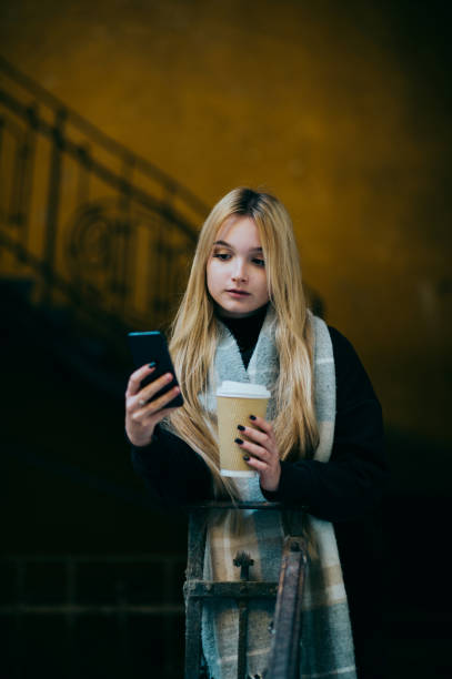 istock Young woman using the phone 1413846917