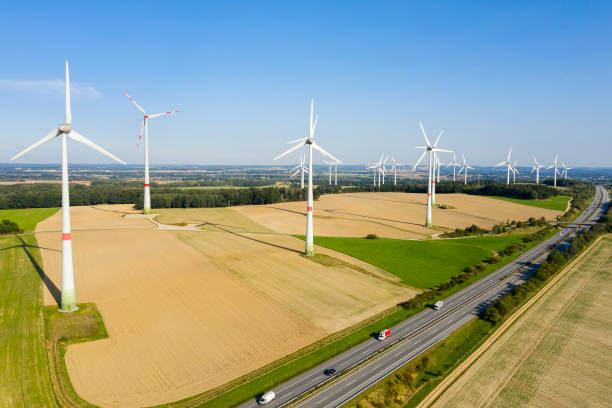 istock Wind Turbines and Highway From Above 1413847213