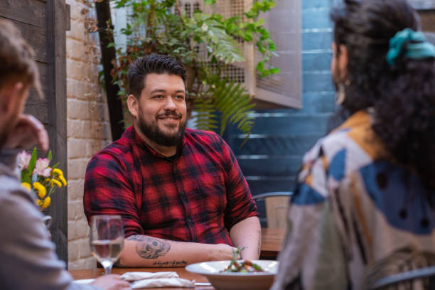 istock Eating a Meal with Friends 1413848973