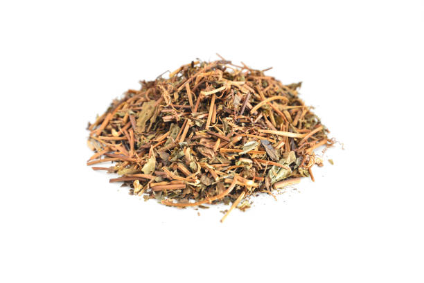 istock Dried tea leaves on a white background with empty space. 1413853150