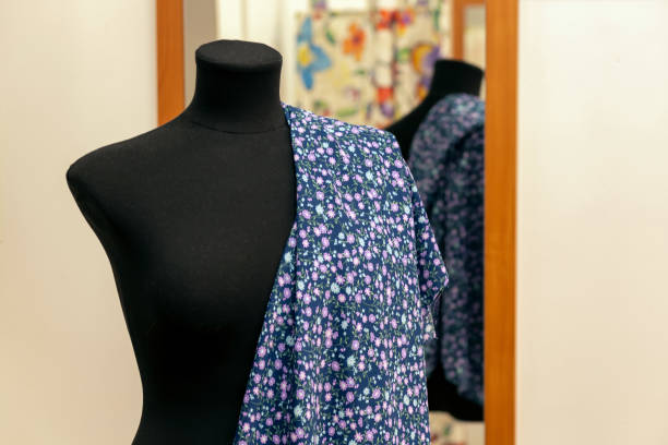 istock Mannequin in the sewing workshop. Seamstress workplace. Small business. 1413857433