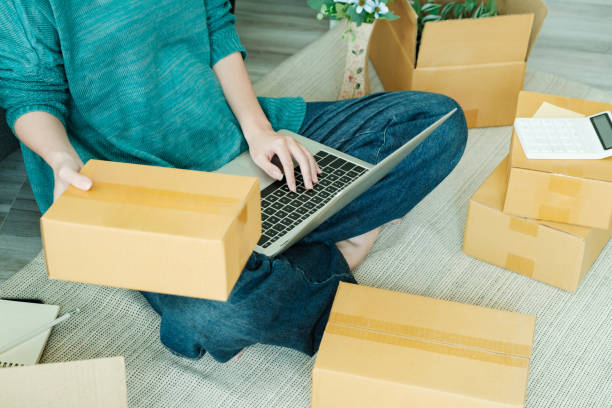 istock Online small business owner checking order. 1413857653