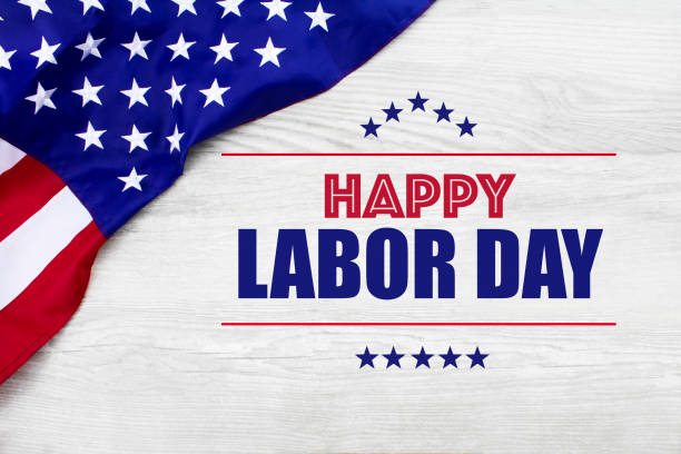 Happy Labor Day with American flag on a white wood background.