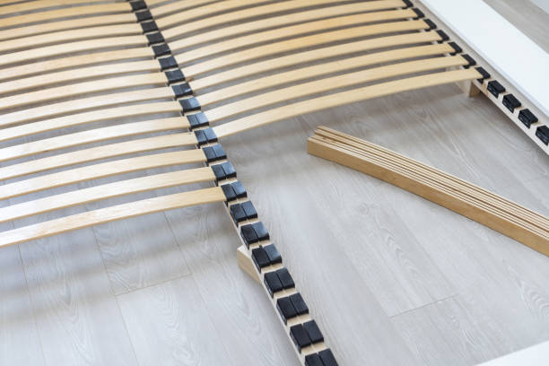 istock disassembled wooden bed on the floor. 1413861492