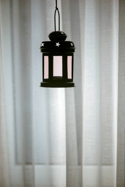 istock New Year's night light, lamp.Light from the window. 1413861548