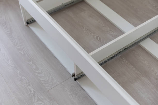 istock disassembled wooden bed on the floor. 1413861603