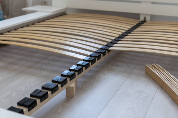 istock disassembled wooden bed on the floor. 1413861677