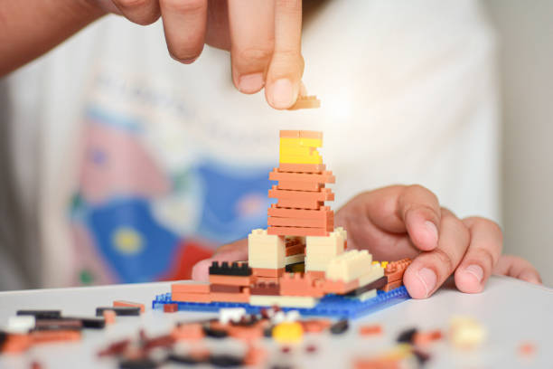 istock Girl playing with blocks 1413861794