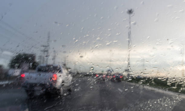 istock Driving on the road Driving in the rain 1413861859