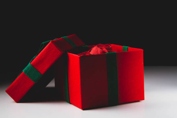 istock Box with a New Year's gift. Christmas pictures. Open box with a gift. 1413867009