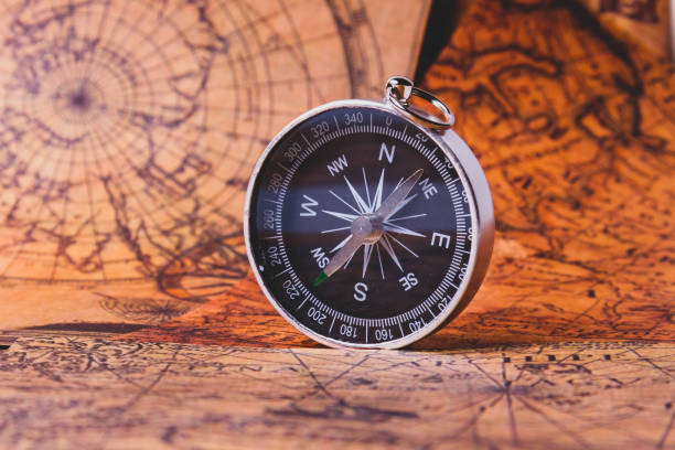 istock Looking for adventure. Compass and maps. Treasure map and path to the treasure. 1413867138