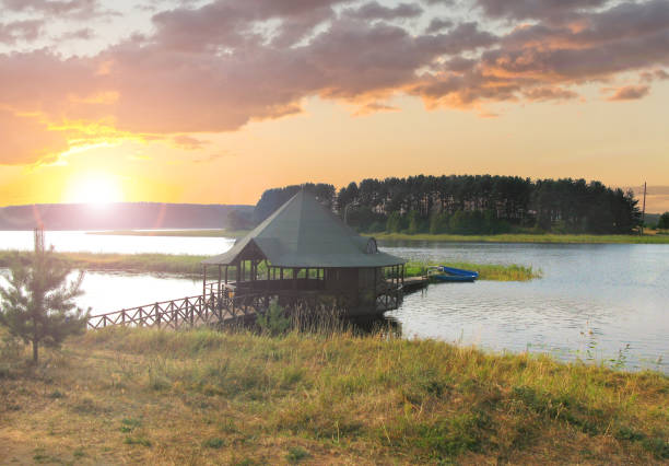 A wooden gazebo for fishing on the bank of Seliger lake. Ostashkov, Tver region, Russia stock photo
