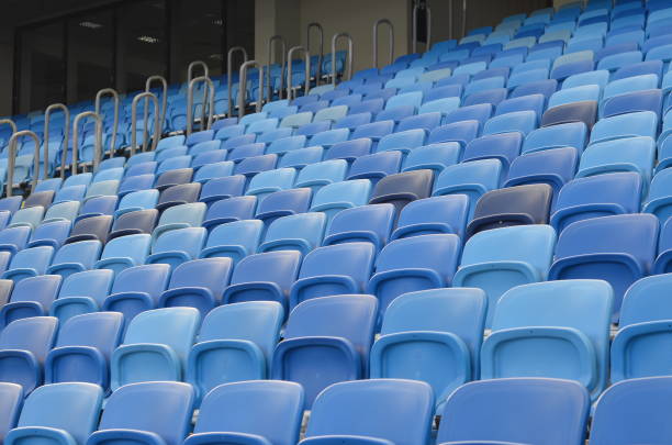 istock sport stadium seats - large audience 1413869629