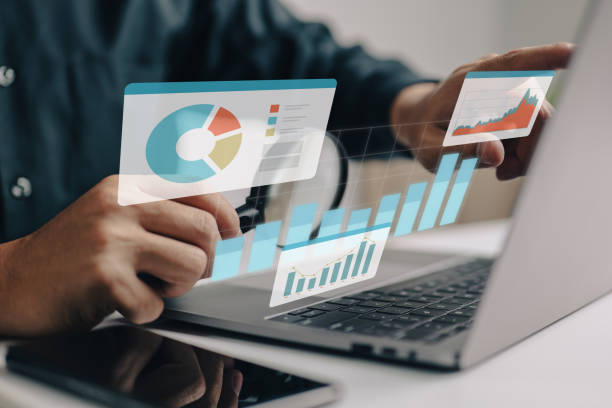 Businesspeople working on a monitor graph dashboard while performing statistical and data analysis for corporate finance and investment ideas. Businesspeople working on a monitor graph dashboard while performing statistical and data analysis for corporate finance and investment ideas. dashboard stock pictures, royalty-free photos & images