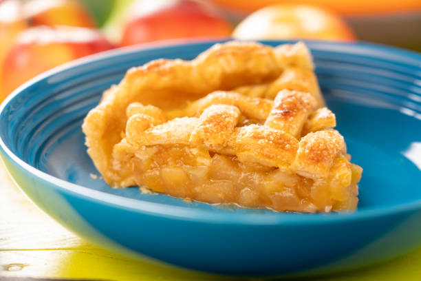istock Apple pie portion of en served on a blue plate. 1413872463
