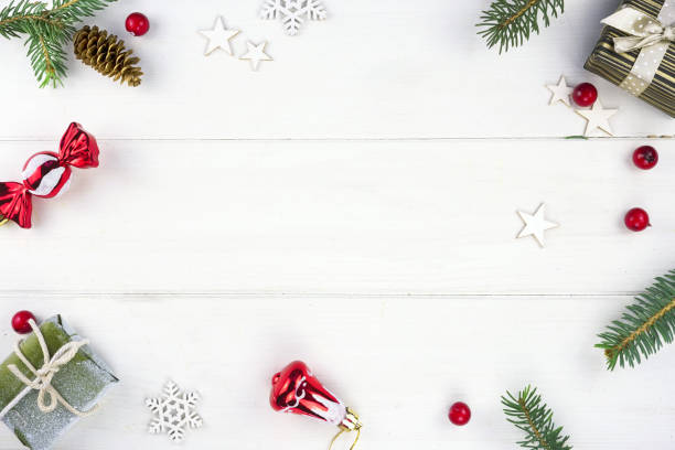 istock Original composition with Christmas decorations on a white wooden background. 1413872511