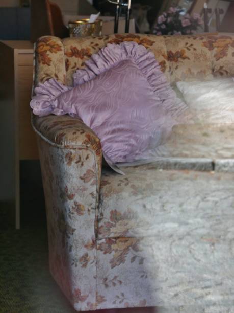 istock Pink plush cushion on old-fashioned sofa 1413872865