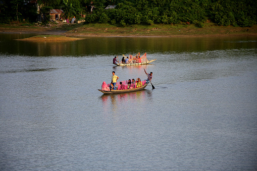 Tourists are traveling by boat to enjoy the natural beauty of the lake in rural areas of Bangladesh. The haors in Sylhet are now full of water, the beauty of the haors increases in monsoons. August 5, 2022, Sylhet, Bangladesh.