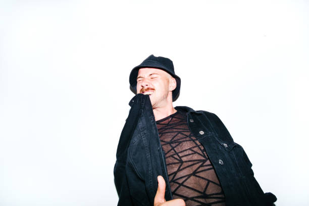 Model In Black Outfit Posing On Isolate Background