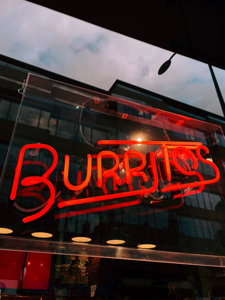 istock Neon sign of burritos restaurant. 1413873858