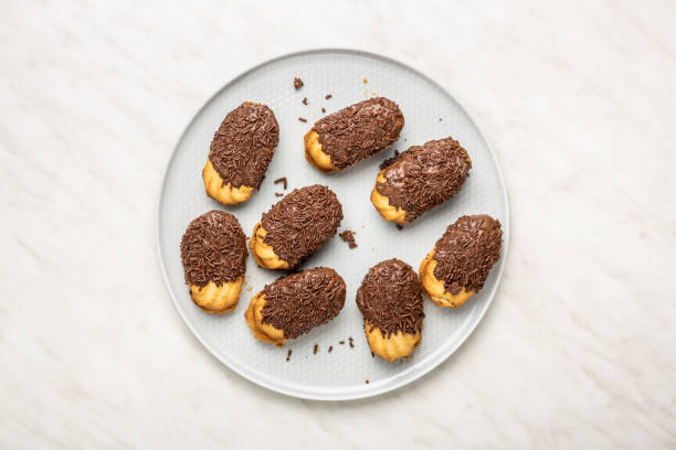 istock Petit fours with chocolate sprinkles. Mini chocolate dessert. 1413876099