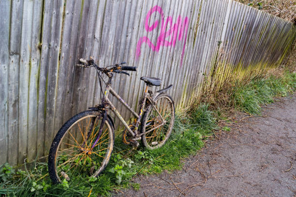 Sawbridgeworth, Hertfordshire England- March 13 2022:An abandoned bike left on a foot path upright and getting dirty every day.