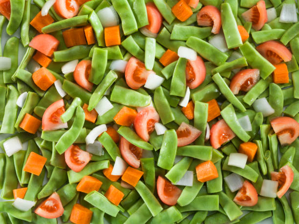 Mexican Mix of Vegetables. Tomatoes, Green Beans, Peas, Corn. Dietary Food.Bright vegetable mix .Vegetarian food.Assorted.