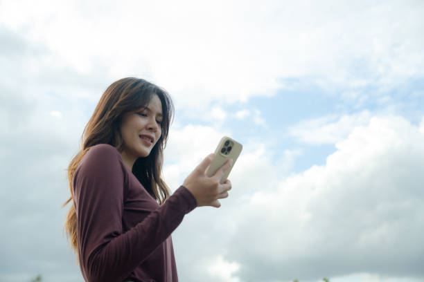 istock Asian Businesswoman using smart phone 1413878414