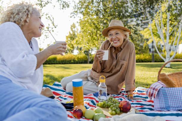 Mother and daughter having a picnic