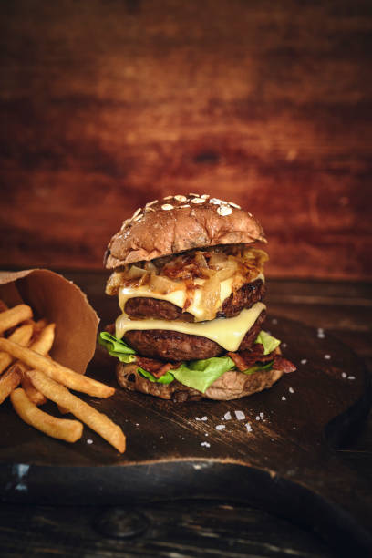 istock Double Beef Burger with Tomato, Cheese, Bacon, Onions and Lettuce 1413878823