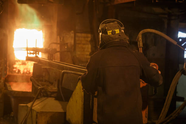 istock Man works with opened hot gas oven. 1413879926