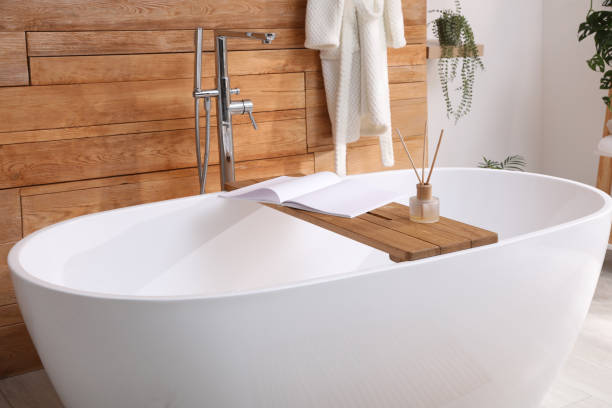 istock White tub and beautiful plants in bathroom, Interior design 1413884188