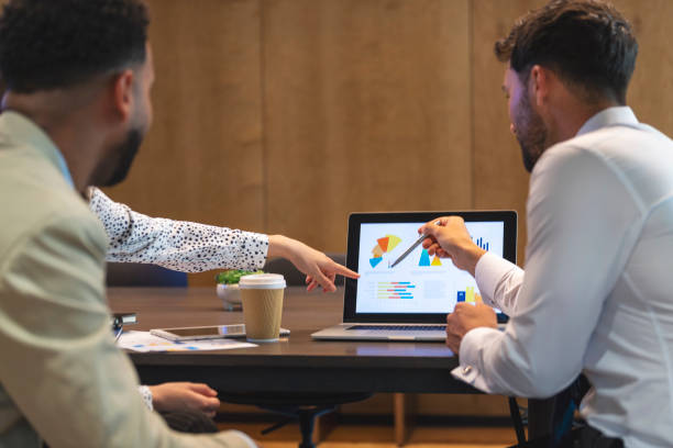 istock Financial advisor or lawyer with couple explaining options. 1413884794
