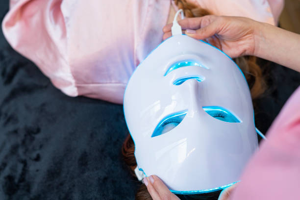 istock professional beautician performs facial procedure to her client 1413884831