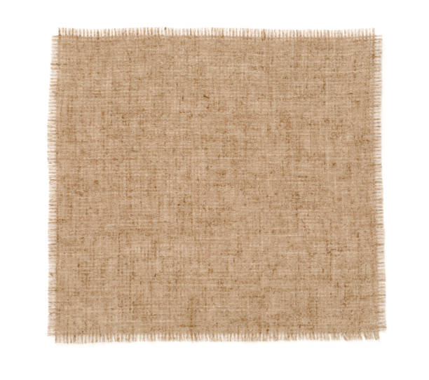 istock Piece of natural burlap fabric on white background, top view 1413884850