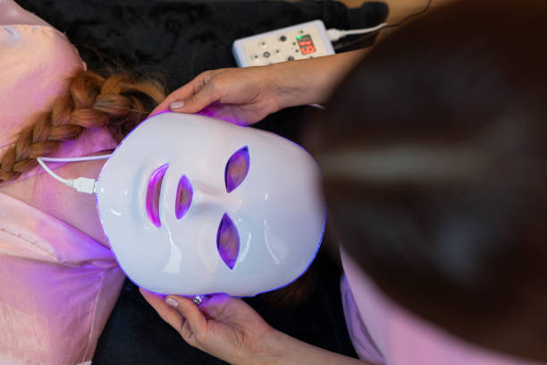 istock professional beautician performs facial procedure to her client 1413884901