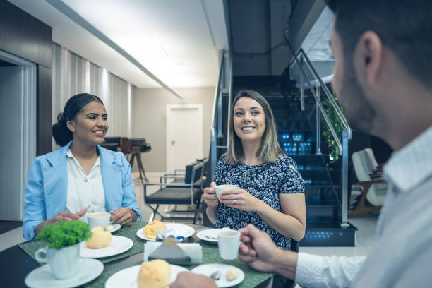 istock Three business friends having coffee after work 1413886316