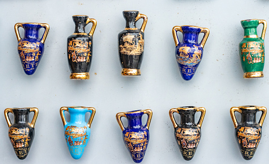 Souvenirs at Rethymnon Town on Crete, Greece, with painted illustrations on each one. They are similar to Kamares ware jugs used by the ancient Minoans.