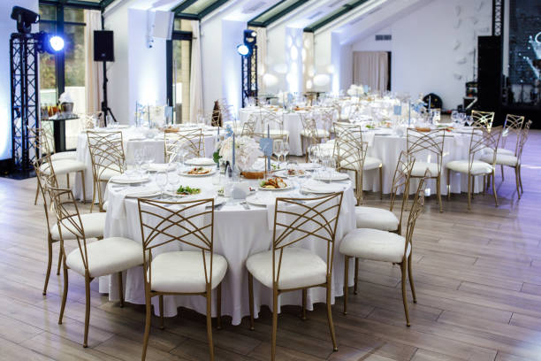 istock Decorated served tables for wedding party or other formal dinner 1413887834