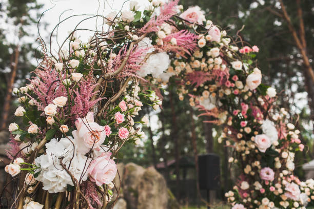 Flowers on the arch for the wedding ceremony