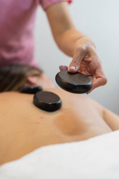 istock professional beautician performs a relaxing procedure to one of her clients 1413888639