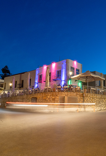 Nightlife at Rethymnon Town on Crete, Greece, with people visible at a bar.