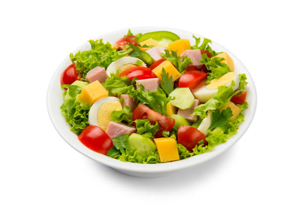 istock Chef salad with cheese, ham and vegetables isolated on white background. 1413889887