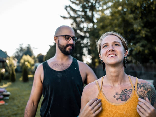 istock Artist couple taking a break from creating mural 1413891957