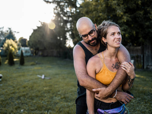 istock Artist couple taking a break from creating mural 1413891972